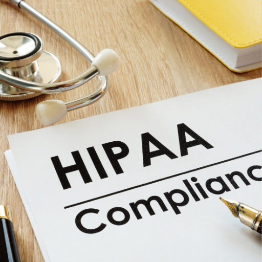 One Guy Consulting: HIPAA Compliance written on paper on clipboard